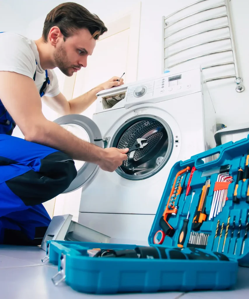 man repair washer